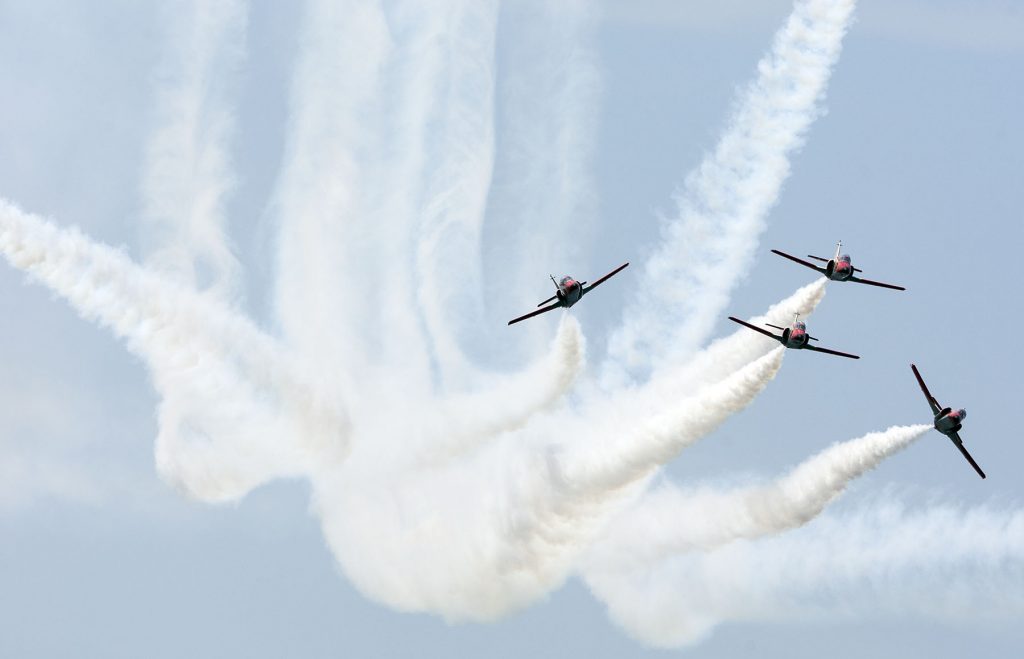 Members of the Spanish Air Force's 'Patrulla Aguila' ('Eagle Patrol' ) fly during an air show with CASA C-101 jets in 'Playa de la Victoria' Cadiz, southern Spain, on Sunday, Sep. 13, 2009 (AP Photo/Miguel Gomez)