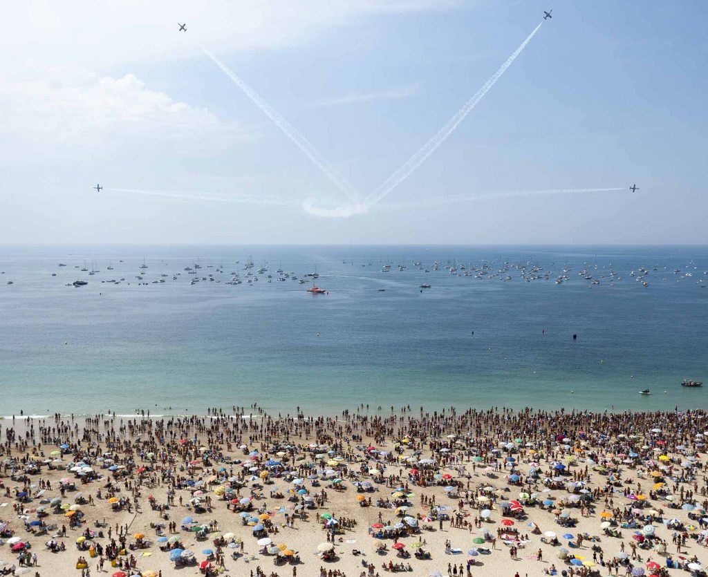 Members of the Spanish Air Force's 'Patrulla Aguila' ('Eagle Patrol' ) fly during an air show with CASA C-101 jets in 'Playa de la Victoria' Cadiz, southern Spain, on Sunday, Sep. 13, 2009 (AP Photo/Miguel Gomez)