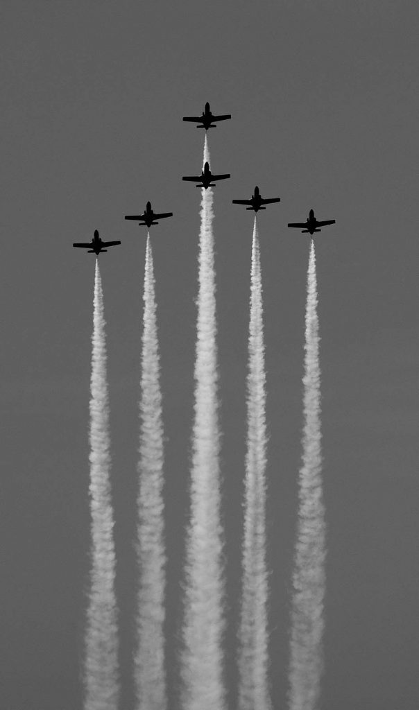 Members of the Spanish Air Force's 'Patrulla Aguila' ('Eagle Patrol' ) fly during an air show with CASA C-101 jets in 'Playa de la Victoria' Cadiz, southern Spain, on Sunday, Sep. 13, 2009 (AP Photo/Miguel Gomez)