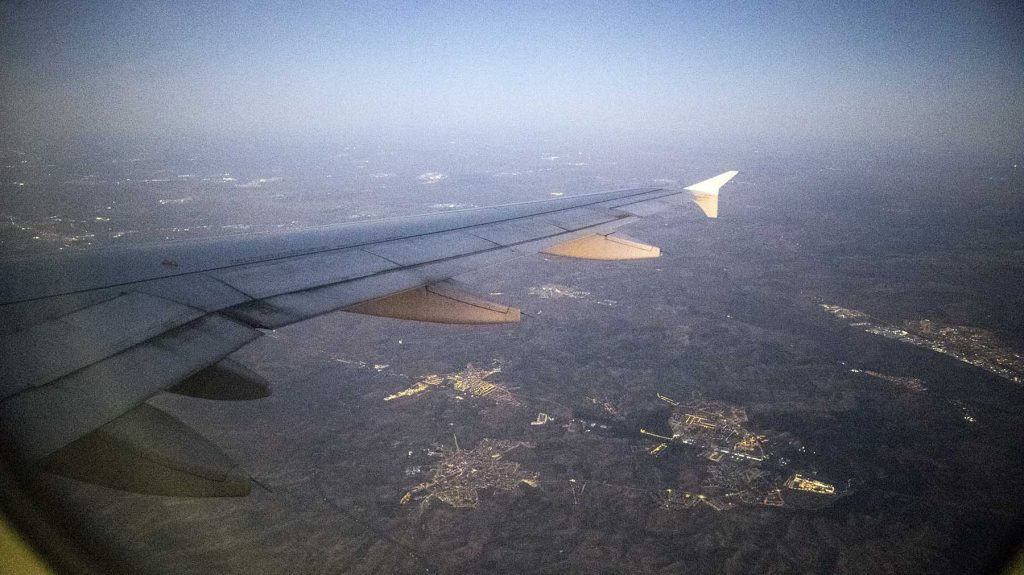 airplane-flight-wings-city-lights