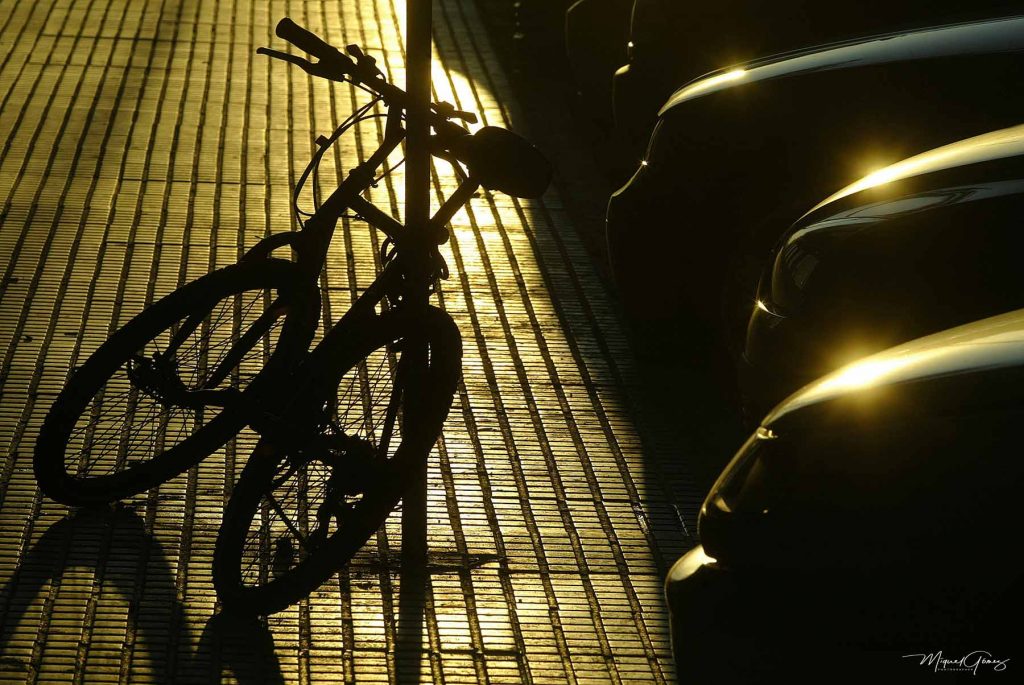 bike-car-golden-silhouette
