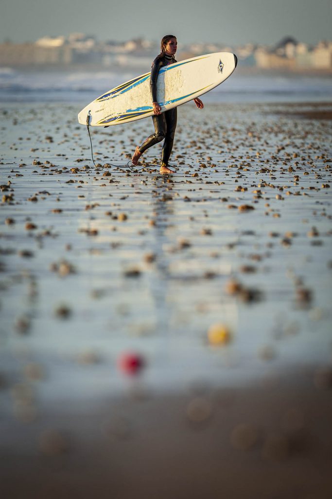 surfer and stones